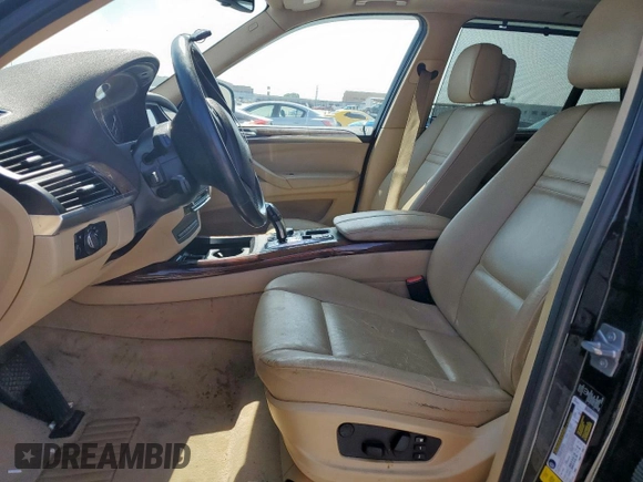 2012 BMW X5 35d with VIN 5UXZW0C57CL664245, listed as a Copart auction lot 58356885 with 148,517 mi miles and Clean title. Bid and sale history available at DreamBid. Image 7.