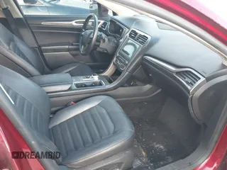 2017 Ford Fusion SE z VIN 3FA6P0HD2HR401046, wystawiony jako IAAI lot #41965539 z przebiegiem 92 664 mil mil oraz . Historia ofert i sprzedaży dostępna na DreamBid. Obrazek 5.