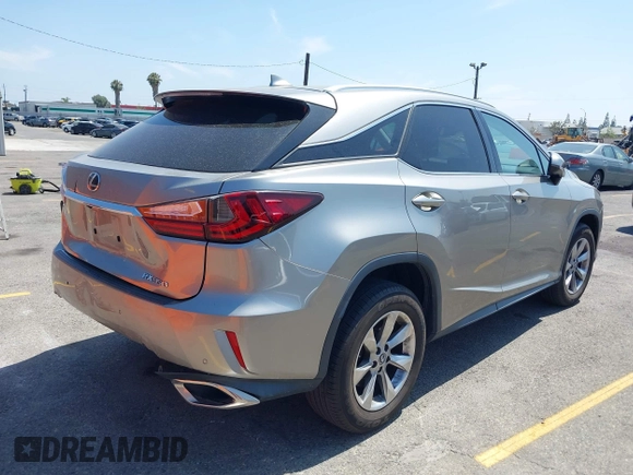 2018 Lexus RX 350 with VIN 2T2ZZMCA4JC115390, listed as a IAAI auction lot 42515866 with 51,760 mi miles and . Bid and sale history available at DreamBid. Image 4.