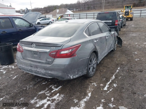 2018 Nissan Altima 2.5 SL with VIN 1N4AL3AP3JC159979, listed as a IAAI auction lot 41262870 with 87,249 mi miles. Bid and sale history available at carsss.com. Image 4.