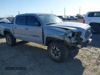 2018 Toyota Tacoma SR with VIN 5TFCZ5AN5JX146333, listed as a IAAI auction lot 41730553 with 140,649 mi miles and . Bid and sale history available at DreamBid. Image 1.