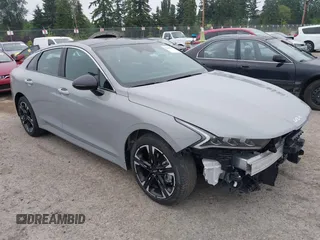 2022 Kia K5 GT-Line z VIN 5XXG64J2XNG133729, wystawiony jako IAAI lot #42440669 z przebiegiem 36 376 mil mil oraz . Historia ofert i sprzedaży dostępna na DreamBid. Obrazek 1.