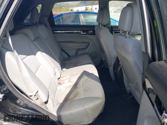 2011 Kia Sorento LX with VIN 5XYKT4A23BG055143, listed as a IAAI auction lot 42118676 with 174,268 mi miles. Bid and sale history available at carsss.com. Image 8.