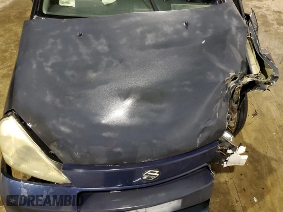 2003 Suzuki Aerio S z VIN JS2RA41S035159741, wystawiony jako Copart lot #88080235 z przebiegiem Nie podano mil oraz Szkoda całkowita • Salvage title. Historia ofert i sprzedaży dostępna na DreamBid. Obrazek 11.