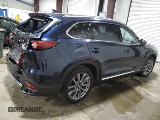 2023 Mazda CX-9 Grand Touring with VIN JM3TCBDY1P0630868, listed as a Copart auction lot 56321205 with 50,427 mi miles and Salvage title. Bid and sale history available at DreamBid. Image 3.