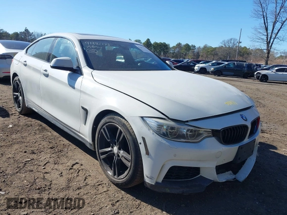 2015 BMW 4 Series 428i xDrive with VIN WBA4C9C51FD331298, listed as a IAAI auction lot 41892173 with 120,484 mi miles and . Bid and sale history available at DreamBid. Image 6.