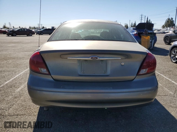 2001 Ford Taurus LX Standard z VIN 1FAFP52U51A138332, wystawiony jako Copart lot #88528355 z przebiegiem 166 511 mil mil oraz Szkoda całkowita • Salvage title. Historia ofert i sprzedaży dostępna na DreamBid. Obrazek 6.