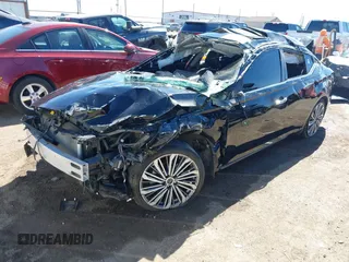 2023 Nissan Altima SL with VIN 1N4BL4EV4PN409827, listed as a IAAI auction lot 41660359 with 27,364 mi miles and . Bid and sale history available at DreamBid. Image 2.