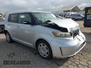 2009 Scion xB with VIN JTLKE50E691089958, listed as a IAAI auction lot 41700775 with 129,396 mi miles. Bid and sale history available at carsss.com. Image 1.