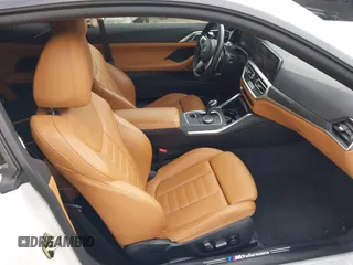 2021 BMW 4 Series M440i xDrive with VIN WBA13AR06MCF78418, listed as a IAAI auction lot 41257716 with 35,974 mi miles and . Bid and sale history available at carsss.com. Image 5.