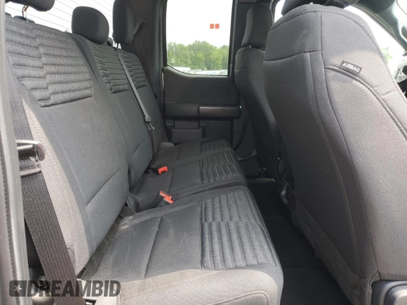 2023 Ford F-150 XL with VIN 1FTEX1EP9PKE34381, listed as a Copart auction lot 63938505 with 13,933 mi miles and Salvage title. Bid and sale history available at DreamBid. Image 10.