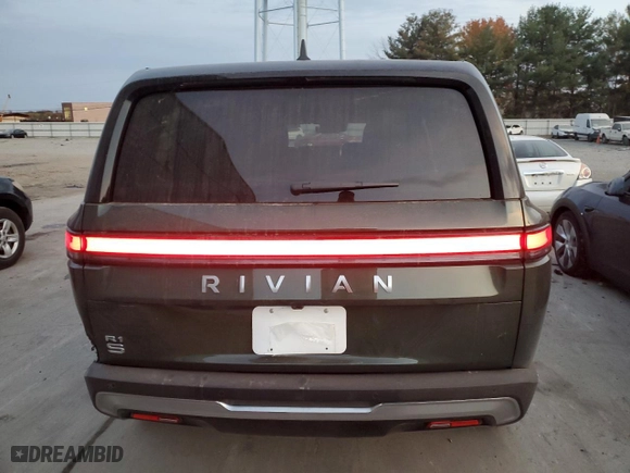 2025 Rivian R1S Adventure with VIN 7PDSGBBA1SN049423, listed as a Copart auction lot 77738224 with 0 mi miles and Salvage Title. Bid and sale history available at carsss.com. Image 6.