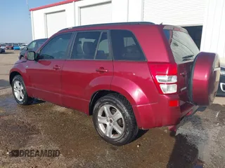 2007 Suzuki Grand Vitara Luxury z VIN JS3TE947474200491, wystawiony jako IAAI lot #42462678 z przebiegiem 230 007 mil mil oraz . Historia ofert i sprzedaży dostępna na DreamBid. Obrazek 3.