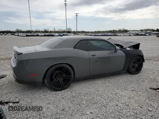 2019 Dodge Challenger R/T z VIN 2C3CDZBT2KH550896, wystawiony jako Copart lot #52299865 z przebiegiem 113 772 mil mil oraz Szkoda całkowita • Salvage title. Historia ofert i sprzedaży dostępna na DreamBid. Obrazek 3.