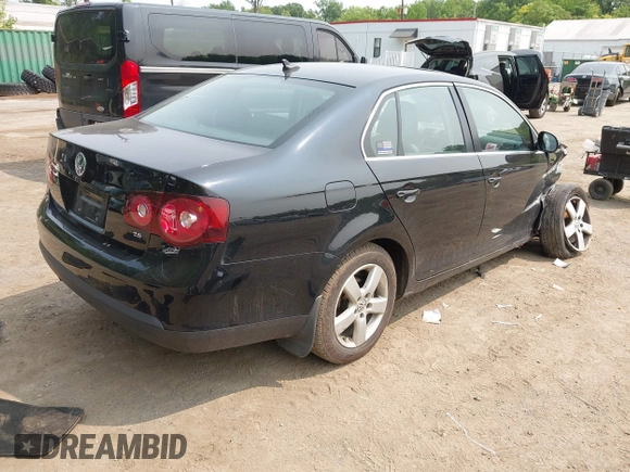 2009 Volkswagen Jetta SE with VIN 3VWRZ71K29M078499, listed as a IAAI auction lot 42399407 with 124,484 mi miles and . Bid and sale history available at DreamBid. Image 4.