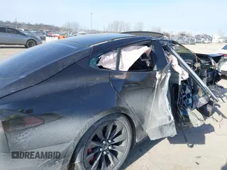 2016 Tesla Model S 90D with VIN 5YJSA1E42GF143731, listed as a IAAI auction lot 41394839 with Not provided miles and . Bid and sale history available at DreamBid. Image 6.