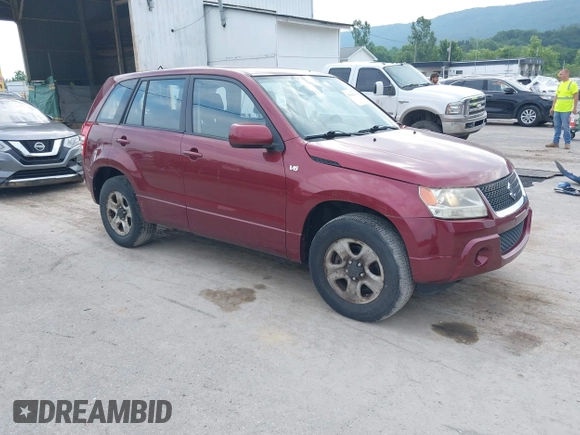 2008 Suzuki Grand Vitara w/Spare & Cargo Covers z VIN JS3TD941784101146, wystawiony jako IAAI lot #42546416 z przebiegiem 83 064 mil mil oraz . Historia ofert i sprzedaży dostępna na DreamBid. Obrazek 1.