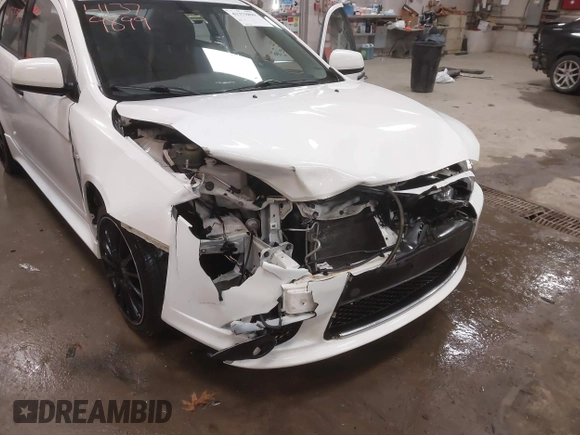 2014 Mitsubishi Lancer GT with VIN JA32U8FWXEU016230, listed as a IAAI auction lot 41379899 with 108,511 mi miles. Bid and sale history available at carsss.com. Image 6.