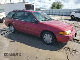 1995 Ford Escort z VIN 1FASP15J1SW344941, wystawiony jako Copart lot #73689754 z przebiegiem Nie podano mil oraz Nie do naprawy. Historia ofert i sprzedaży dostępna na DreamBid. Obrazek 4.
