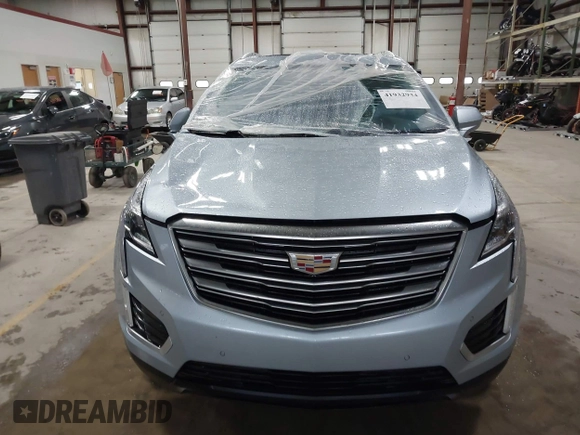 2017 Cadillac XT5 Premium Luxury AWD z VIN 1GYKNERS4HZ306955, wystawiony jako IAAI lot #41932934 z przebiegiem 150 050 mil mil oraz . Historia ofert i sprzedaży dostępna na DreamBid. Obrazek 12.