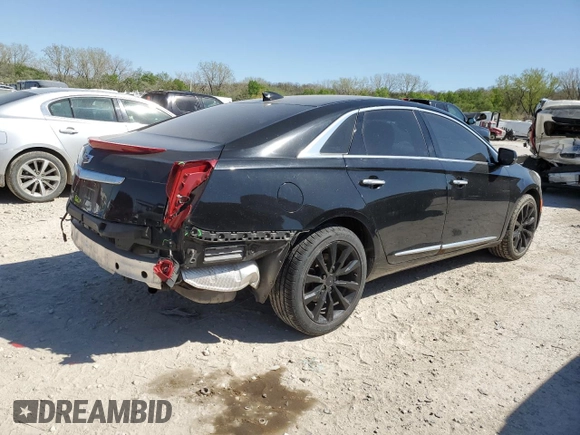 2016 Cadillac XTS Luxury Collection with VIN 2G61N5S37G9197536, listed as a Copart auction lot 52705785 with 143,434 mi miles and Salvage title. Bid and sale history available at DreamBid. Image 3.