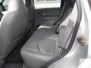 2001 Mazda Tribute LX with VIN 4F2YU08151KM06561, listed as a IAAI auction lot 41478779 with 54,826 mi miles and . Bid and sale history available at DreamBid. Image 8.