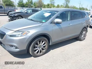 2014 Mazda CX-9 Grand Touring z VIN JM3TB3DV4E0429428, wystawiony jako IAAI lot #42094028 z przebiegiem 147 294 mil mil oraz . Historia ofert i sprzedaży dostępna na DreamBid. Obrazek 17.
