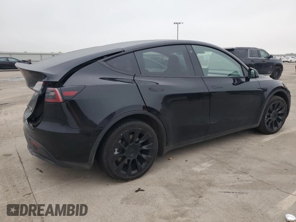 2022 Tesla Model Y Long Range with VIN 7SAYGAEE1NF381491, listed as a Copart auction lot 52694185 with 33,412 mi miles and Salvage Title. Bid and sale history available at DreamBid. Image 3.