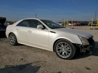 2012 Cadillac CTS Premium with VIN 1G6DS5E33C0141549, listed as a Copart auction lot 48480825 with 137,429 mi miles and Salvage title. Bid and sale history available at DreamBid. Image 4.