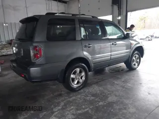 2007 Honda Pilot EX with VIN 2HKYF18447H527065, listed as a IAAI auction lot 41727398 with 147,121 mi miles. Bid and sale history available at carsss.com. Image 4.