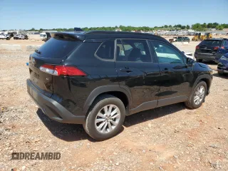 2023 Toyota Corolla Cross LE with VIN 7MUCAAAG3PV058094, listed as a Copart auction lot 57983105 with 30,593 mi miles and Salvage title. Bid and sale history available at DreamBid. Image 3.