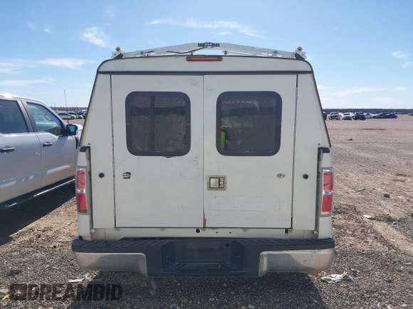 2012 Ford F-150 XL with VIN 1FTMF1CM9CKD33309, listed as a IAAI auction lot 41427178 with 125,029 mi miles. Bid and sale history available at carsss.com. Image 15.