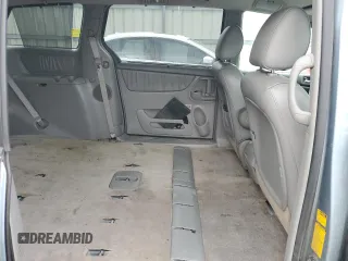 2009 Toyota Sienna XLE z VIN 5TDZK22C09S252216, wystawiony jako Copart lot #57690045 z przebiegiem 132 012 mil mil oraz Nie do naprawy • Non repairable. Historia ofert i sprzedaży dostępna na DreamBid. Obrazek 11.