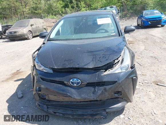 2022 Toyota Prius L Eco with VIN JTDKAMFU1N3182790, listed as a IAAI auction lot 41993264 with 124,777 mi miles and . Bid and sale history available at DreamBid. Image 11.