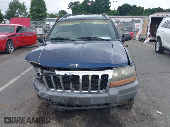 2002 Jeep Grand Cherokee Laredo with VIN 1J4GX48S02C125258, listed as a IAAI auction lot 42388724 with 295,270 mi miles and . Bid and sale history available at DreamBid. Image 12.