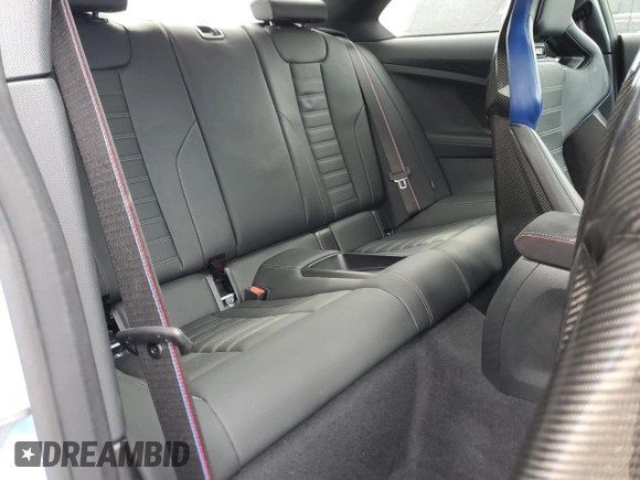 2023 BMW M2 z VIN 3MF13DM00P8D30554, wystawiony jako Copart lot #51641785 z przebiegiem 14 572 mil mil oraz Szkody całkowita. Historia ofert i sprzedaży dostępna na DreamBid. Obrazek 10.