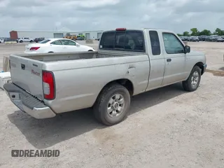 1999 Nissan Frontier XE with VIN 1N6DD26S0XC317003, listed as a IAAI auction lot 42451418 with 246,667 mi miles and . Bid and sale history available at DreamBid. Image 4.