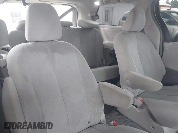 2014 Toyota Sienna L with VIN 5TDZK3DC9ES473780, listed as a IAAI auction lot 42245274 with 203,060 mi miles and . Bid and sale history available at DreamBid. Image 8.