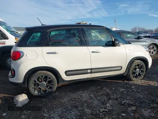 2015 FIAT 500L Urbana Trekking with VIN ZFBCFADH6FZ031908, listed as a IAAI auction lot 41128739 with 117,026 mi miles and . Bid and sale history available at DreamBid. Image 13.