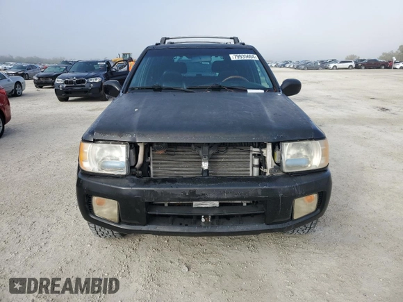 2001 Infiniti QX4 with VIN JNRDR09X21W204207, listed as a Copart auction lot 79935604 with Not Provided miles and Salvage Title. Bid and sale history available at DreamBid. Image 5.