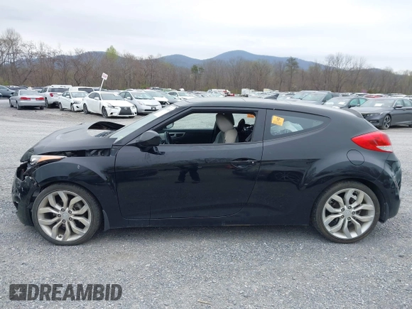 2012 Hyundai Veloster w/Gray Int z VIN KMHTC6AD6CU054422, wystawiony jako IAAI lot #41930634 z przebiegiem 144 681 mil mil oraz . Historia ofert i sprzedaży dostępna na DreamBid. Obrazek 15.