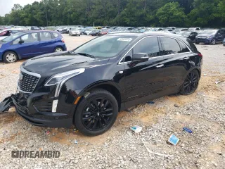 2022 Cadillac XT5 FWD Premium Luxury with VIN 1GYKNCRS0NZ177189, listed as a Copart auction lot 60863875 with 30,104 mi miles and Salvage title. Bid and sale history available at DreamBid. Image 1.