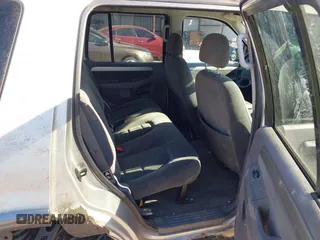 2003 Ford Explorer XLT with VIN 1FMZU73K73ZA61729, listed as a IAAI auction lot 41843868 with 254,553 mi miles. Bid and sale history available at carsss.com. Image 8.