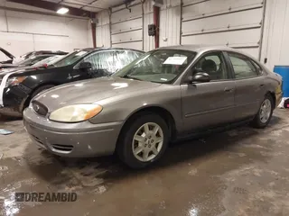 2006 Ford Taurus SE with VIN 1FAFP53U86A113947, listed as a IAAI auction lot 41753927 with 203,867 mi miles. Bid and sale history available at carsss.com. Image 21.