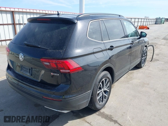 2019 Volkswagen Tiguan SE with VIN 3VV2B7AX6KM066013, listed as a IAAI auction lot 41854035 with 72,322 mi miles and . Bid and sale history available at DreamBid. Image 4.