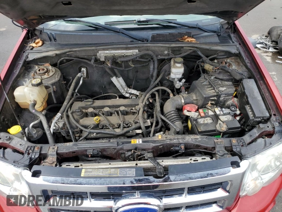 2011 Ford Escape XLS with VIN 1FMCU9C75BKC31381, listed as a Copart auction lot 52886575 with 128,640 mi miles and Salvage title. Bid and sale history available at DreamBid. Image 13.