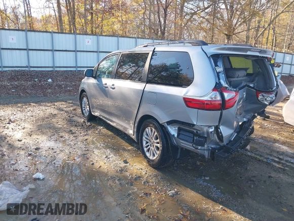 2016 Toyota Sienna XLE with VIN 5TDYK3DC3GS744752, listed as a IAAI auction lot 41077851 with 147,319 mi miles. Bid and sale history available at carsss.com. Image 3.