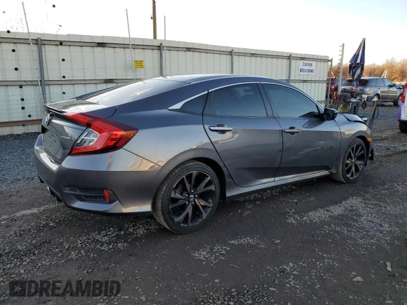 2019 Honda Civic Sport with VIN 2HGFC2F84KH507235, listed as a Copart auction lot 82616034 with 95,751 mi miles and Salvage title. Bid and sale history available at DreamBid. Image 3.