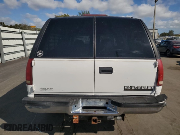 1999 Chevrolet Suburban with VIN 3GNEC16R5XG213001, listed as a Copart auction lot 43498865 with 236,306 mi miles and Salvage Title. Bid and sale history available at carsss.com. Image 6.