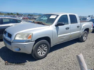 2006 Mitsubishi Raider LS z VIN 1Z7HC28K66S561607, wystawiony jako IAAI lot #42348069 z przebiegiem 162 231 mil mil oraz . Historia ofert i sprzedaży dostępna na DreamBid. Obrazek 2.